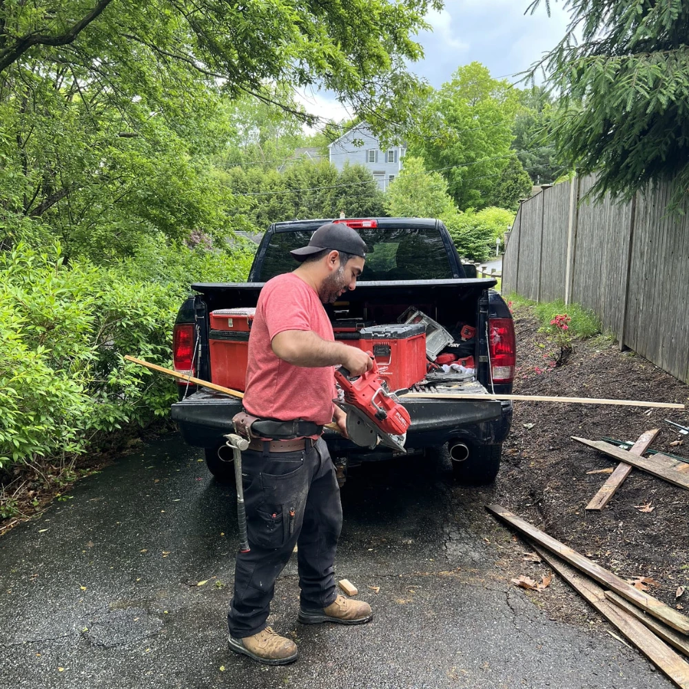 Handyman Sebastian Torres on site in Framingham Massachusetts